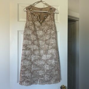 Beautiful appliqué dress. Lightweight and above the knee.